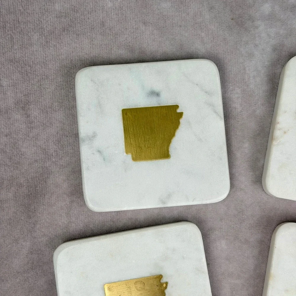 The Royal Standard White Marble Arkansas Brass Inlay Coasters Set of 4